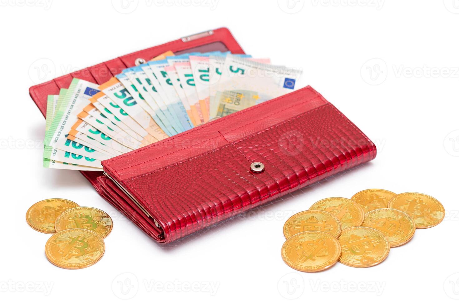 Red Leather Women Purse with Different Euro Banknotes and Bitcoin Coins - Isolated on White Background. A Wallet Full of European Union Paper Money Symbolizing Wealth and Success - Isolation photo