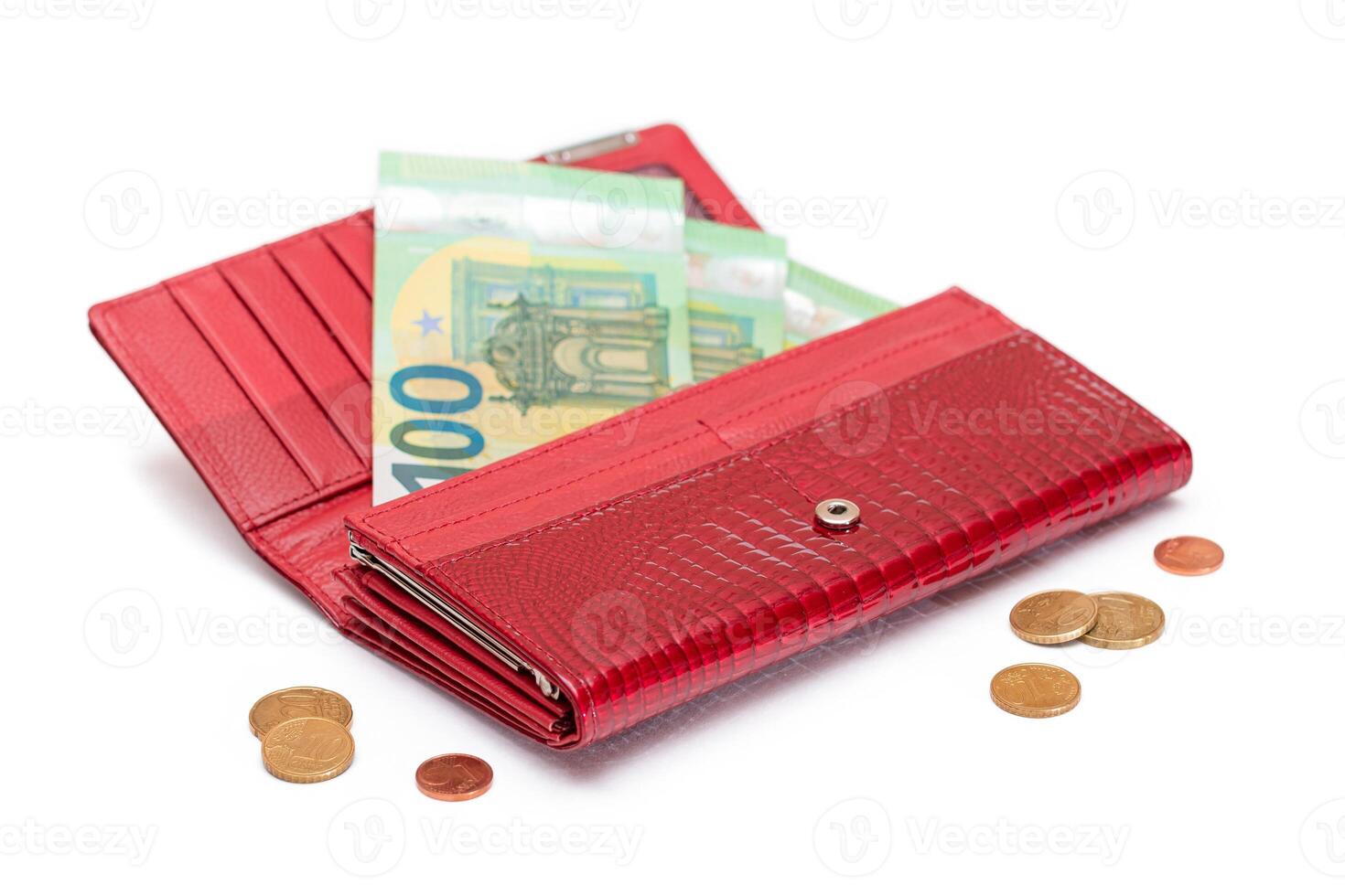 Opened Red Leather Women Purse with One Hundred Euro Banknotes Inside and Euro Cent Coins - Isolated on White Background. A Wallet Full of Money Symbolizing Wealth and Success - Isolation photo