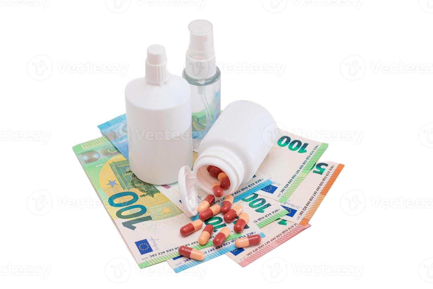 Different Bottles with Pills, Capsules and Medicines on the Euro Banknotes - Isolated on White. Global Pharmaceutical Industry and Big Pharma. Euro Money Bills - Isolation photo