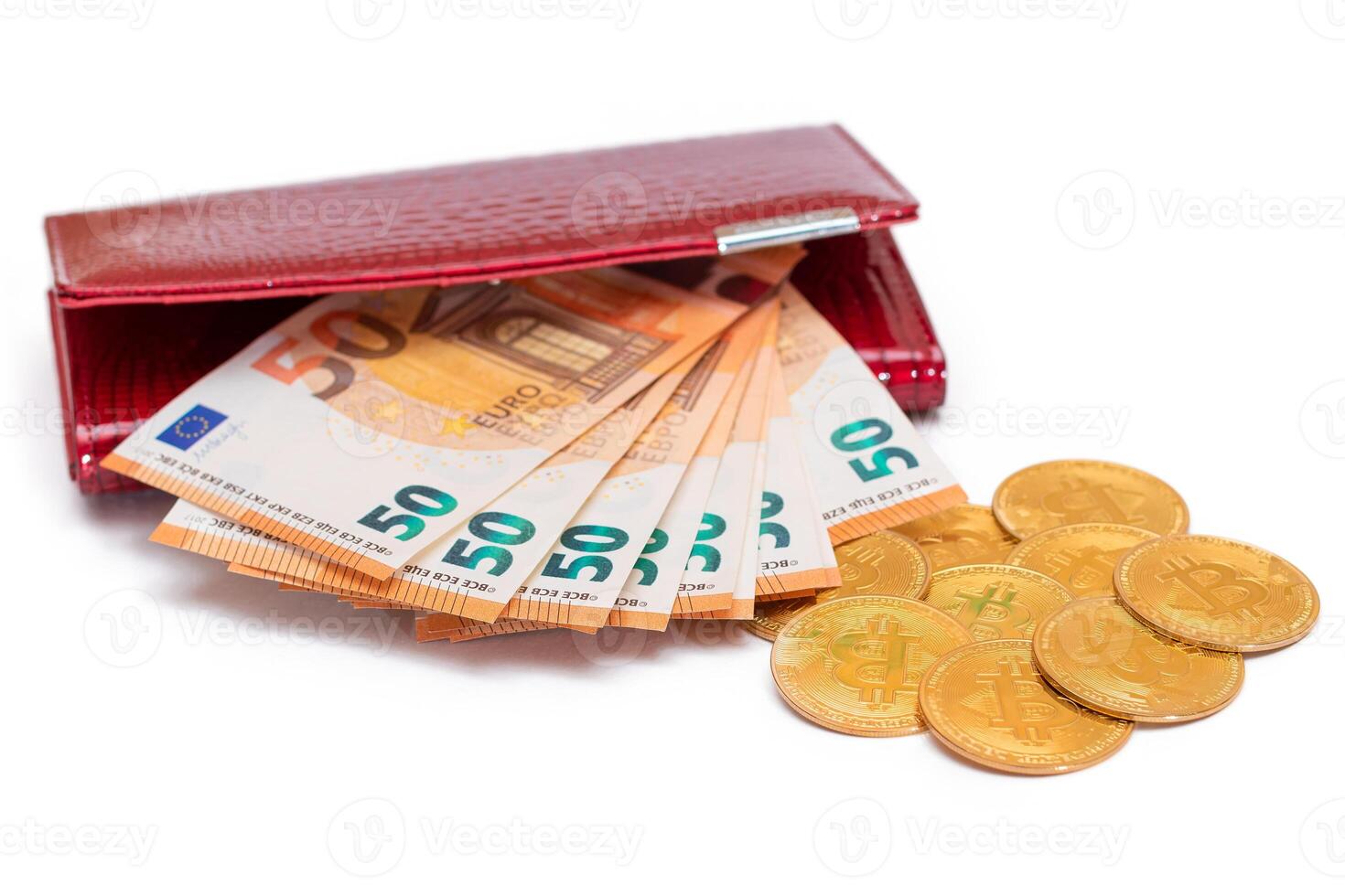 Red Leather Women Purse with Fifty Euro Banknotes and Bitcoin Coins - Isolated on White Background. A Wallet Full of 50 Euro Paper Money Symbolizing Wealth, Success and Social Status - Isolation photo