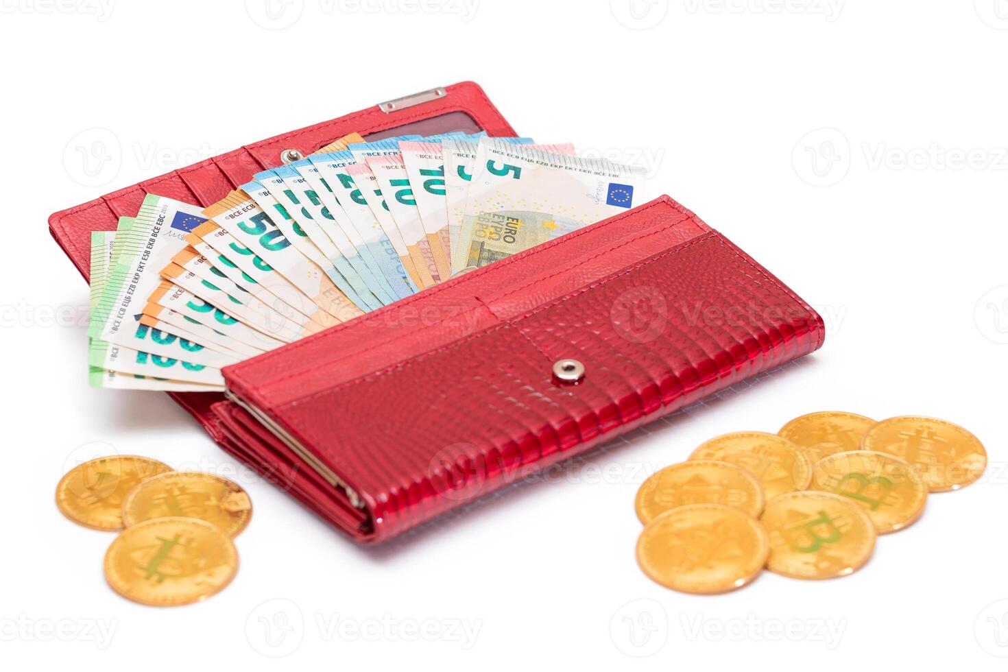 Red Leather Women Purse with Different Euro Banknotes and Bitcoin Coins - Isolated on White Background. A Wallet Full of European Union Paper Money Symbolizing Wealth and Success - Isolation photo