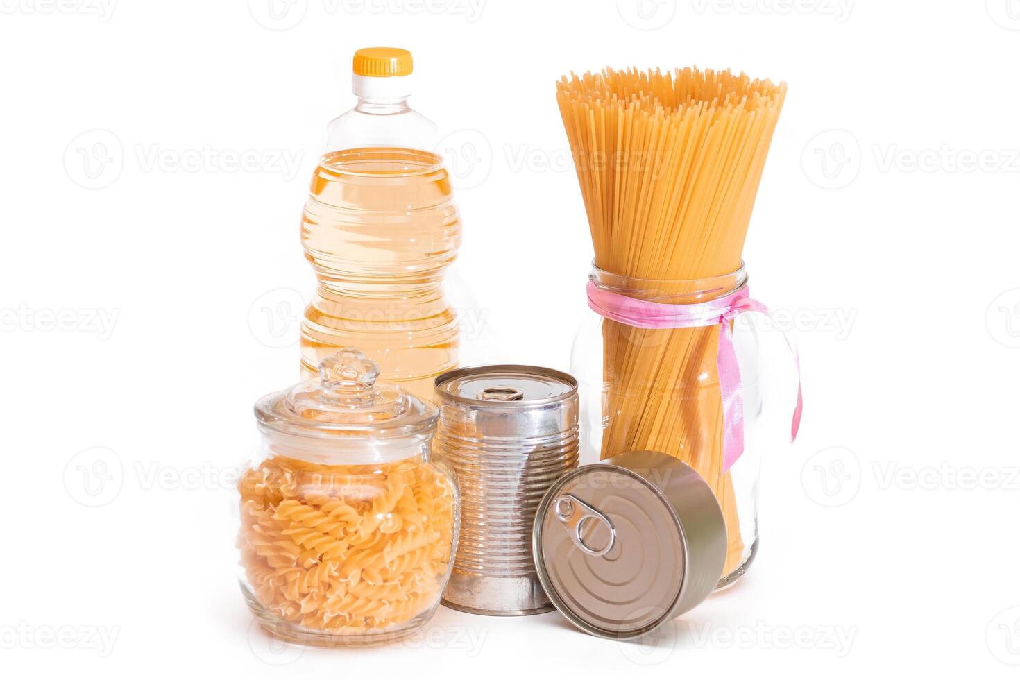 Food Reserves. Canned Food, Spaghetti, Pate, Tuna, Tomato Juice, Pasta, Fish and Grocery - Isolated on White Background. Emergency Food Storage in Case of Crisis. Strategic Food Supplies - Isolation photo