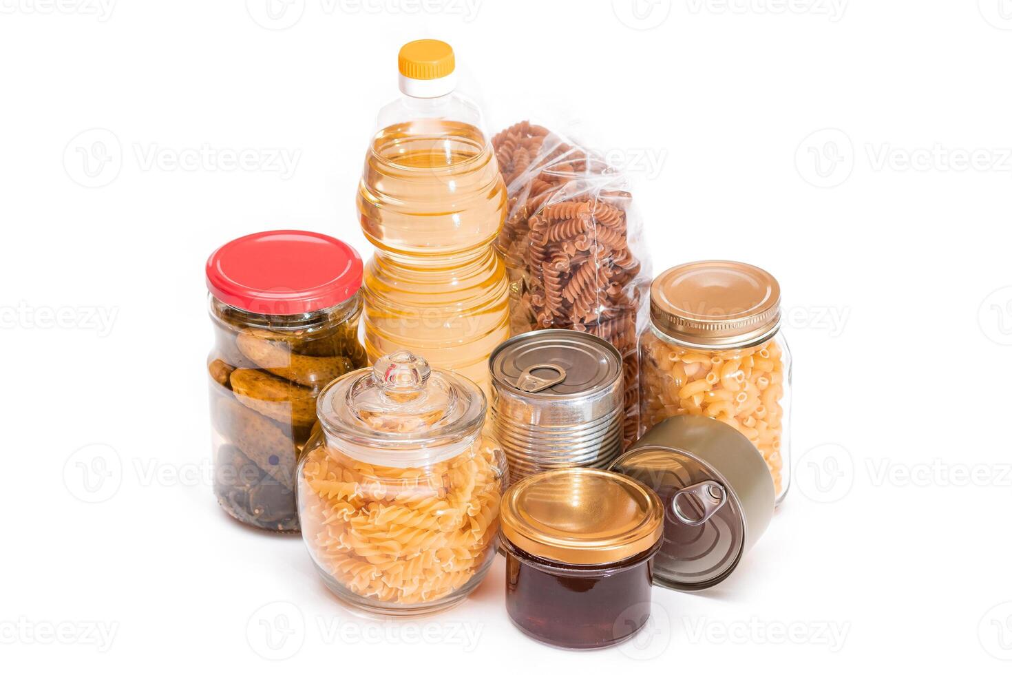 Food Reserves. Canned Food, Spaghetti, Pate, Tuna, Tomato Juice, Pasta, Fish and Grocery - Isolated on White Background. Emergency Food Storage in Case of Crisis. Strategic Food Supplies - Isolation photo