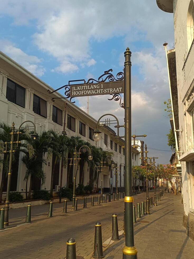 Colonial Era Street Sign Illuminated by the Warm Afternoon Sun photo