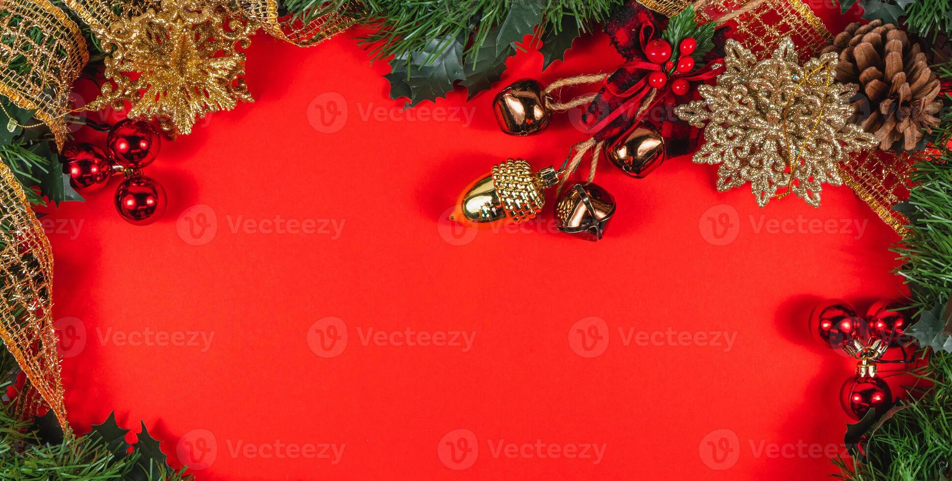 Christmas banner with classic decorations bells star pine cone on red background photo