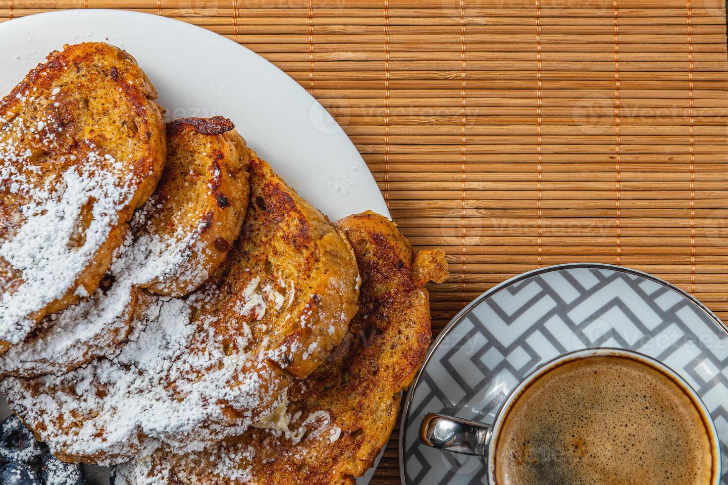 french toast on white plate for breakfast photo