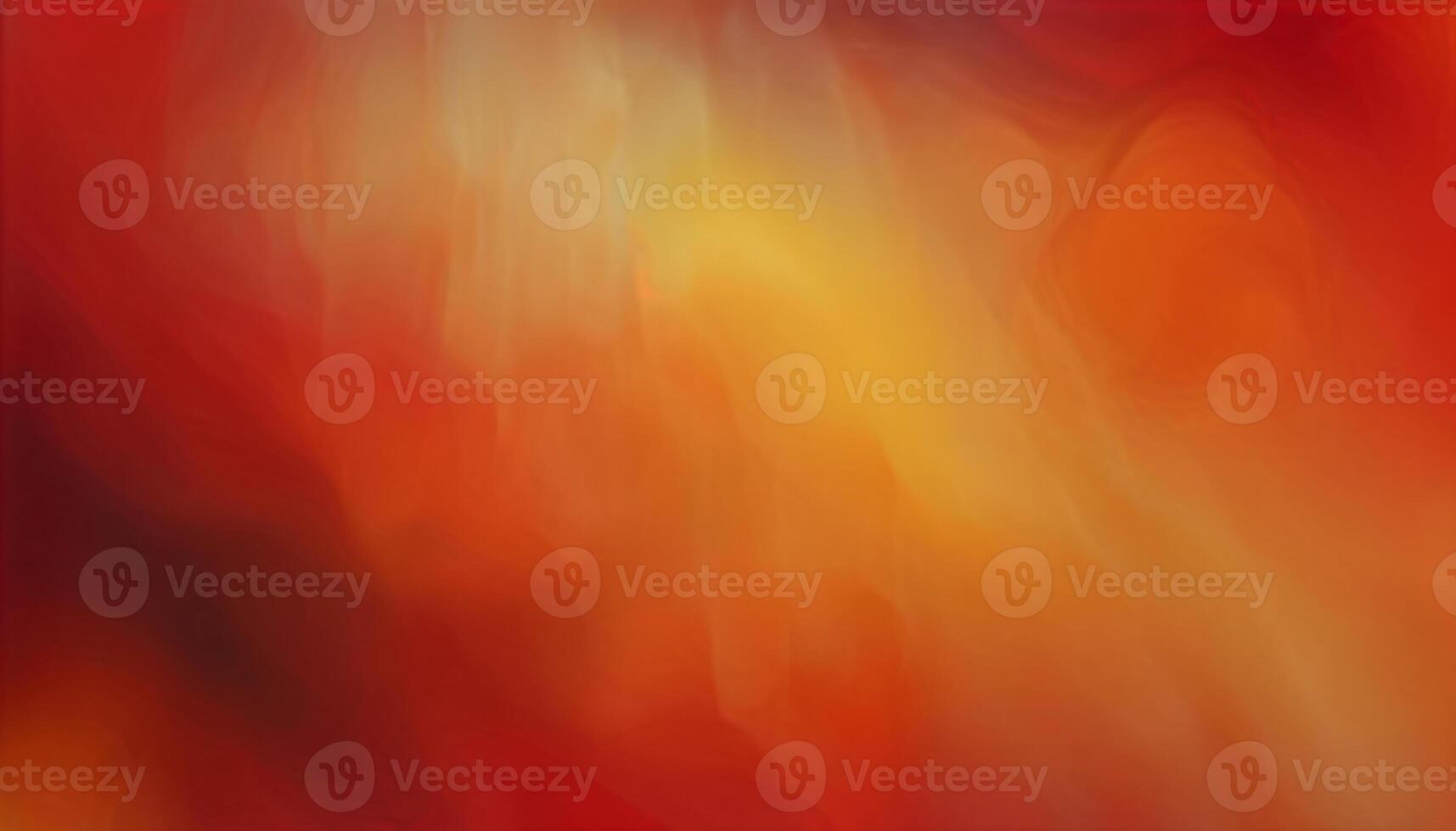 A vibrant abstract background featuring a smooth blend of red, orange, and yellow hues photo
