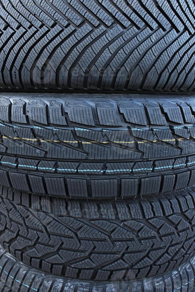 Different designs of winter tire tread blocks for different operating conditions. Tread pattern of variety winter tires vertical image photo