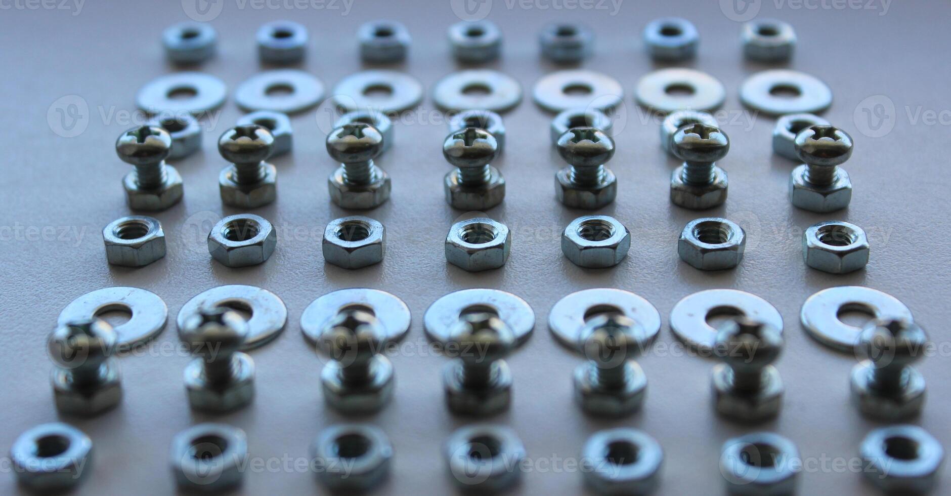 Variety Fixing Hardware Laid Out In Straight Lines Angle View Closeup Stock Image photo