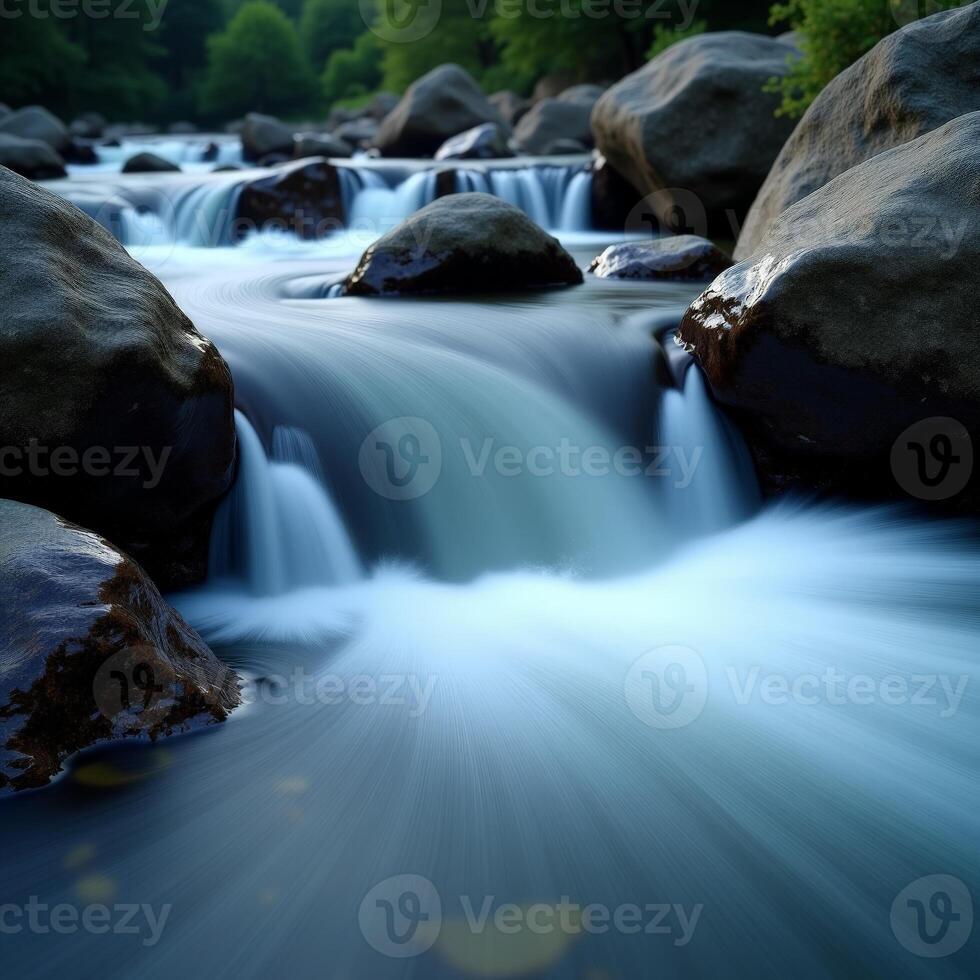 A river flowing over rocks in the forest photo