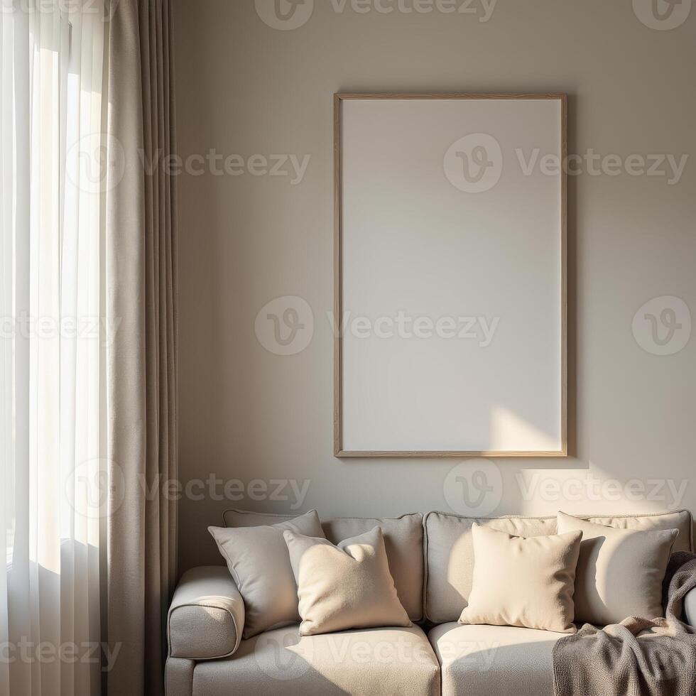 A white couch and a framed picture hanging on the wall photo