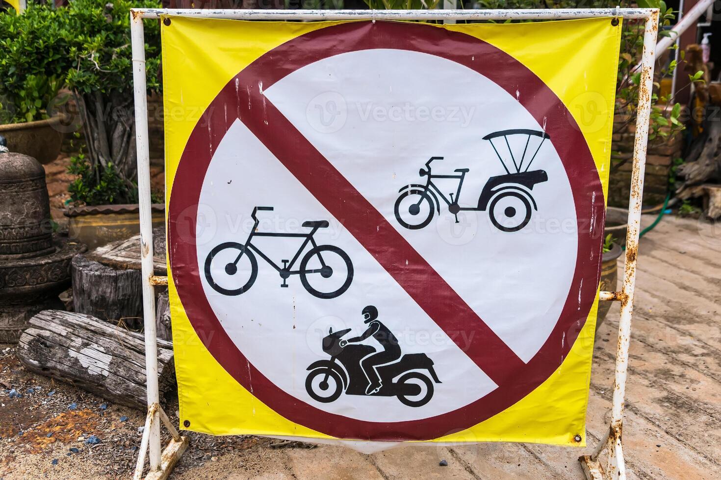 No Entry for Bicycles, Rickshaws, and Motorcycles Sign in Urban Area - Promoting Safe Pedestrian Zones photo