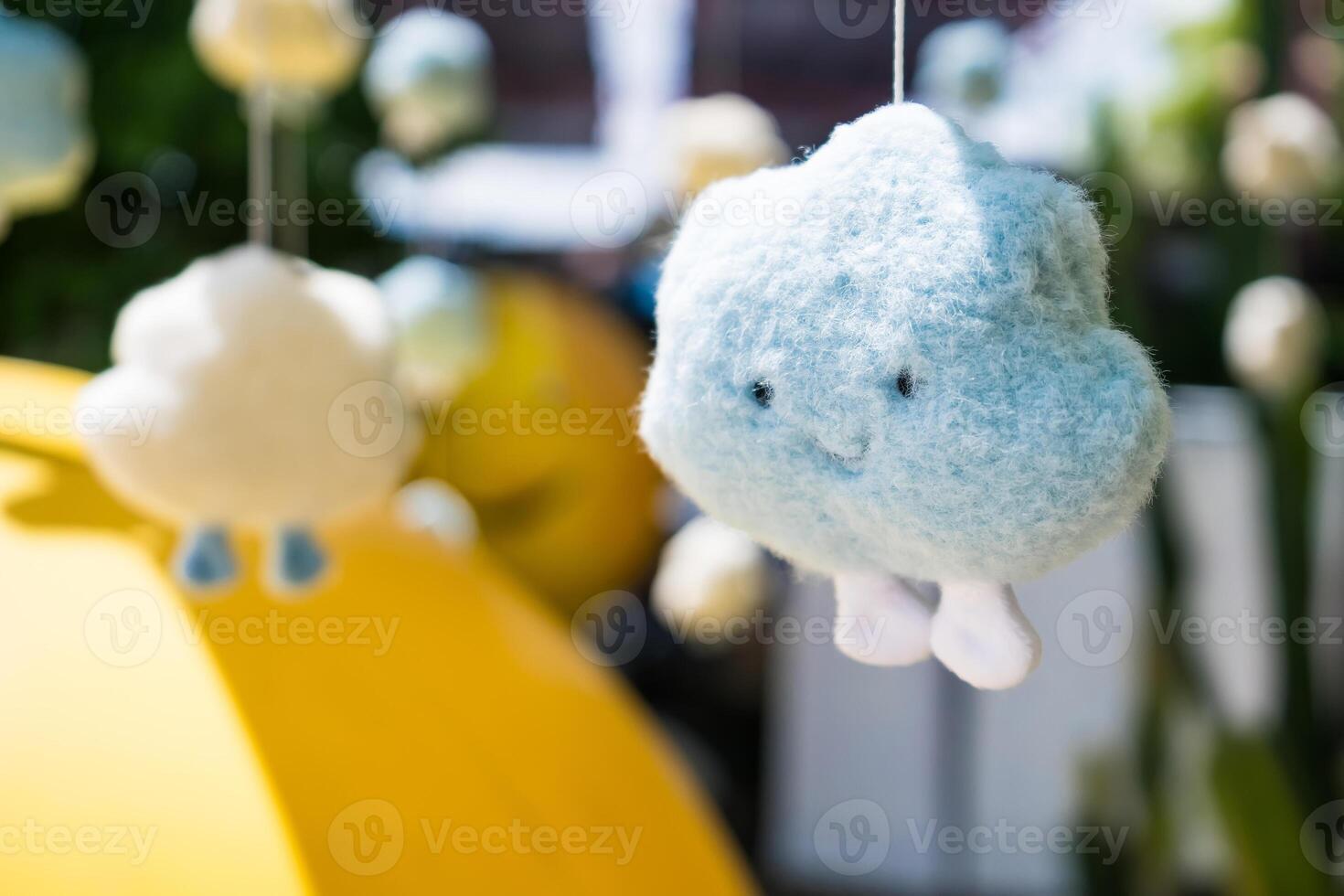 Baby Mobile with Smiling Clouds at Nonthaburii, Thailand. photo