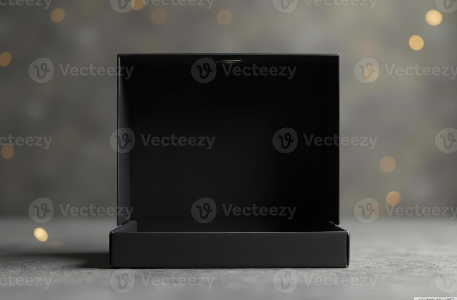 Elegant empty black gift box with bokeh background lighting photo