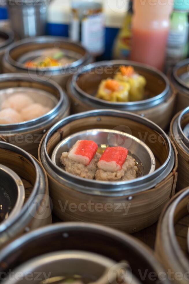 Mix dim sum chinese food in bamboo basket photo