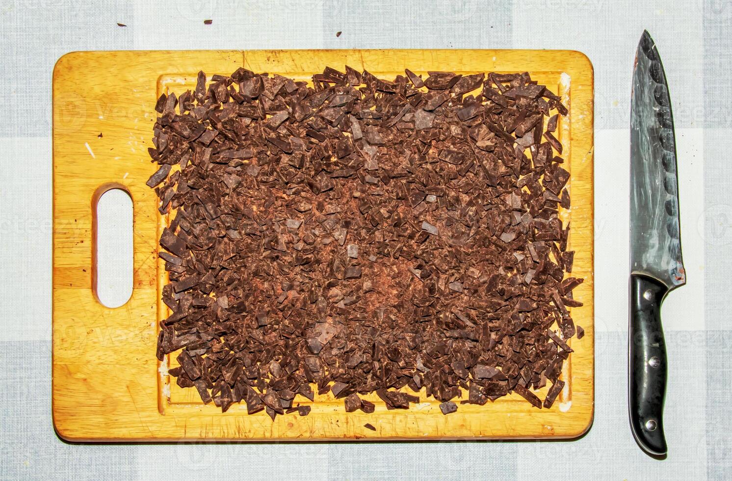 Grated cocoa background, top view, texture. Grated cocoa is one of the ingredients in making chocolate at home. Close-up of crushed cocoa, top view. photo
