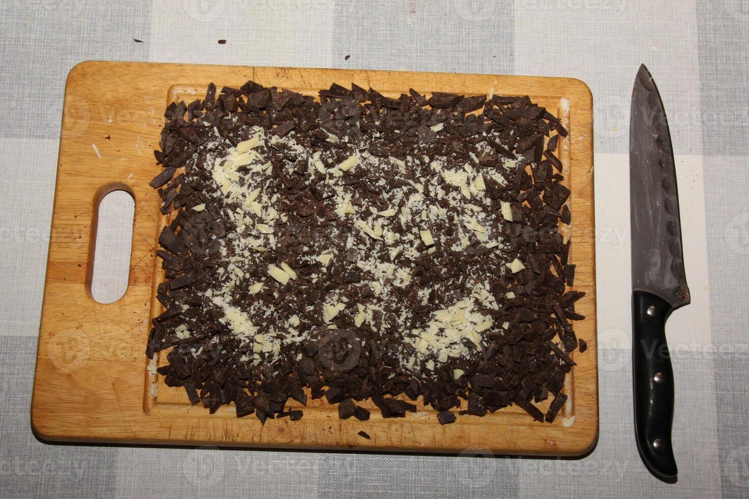 Cocoa butter and cocoa mass, top view, texture. Basic ingredients for making chocolate at home. Close-up of chopped food, top view. photo