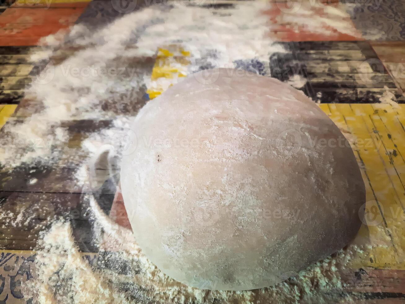 Fresh dough is ready for making dumplings. Unleavened dough for ravioli. photo