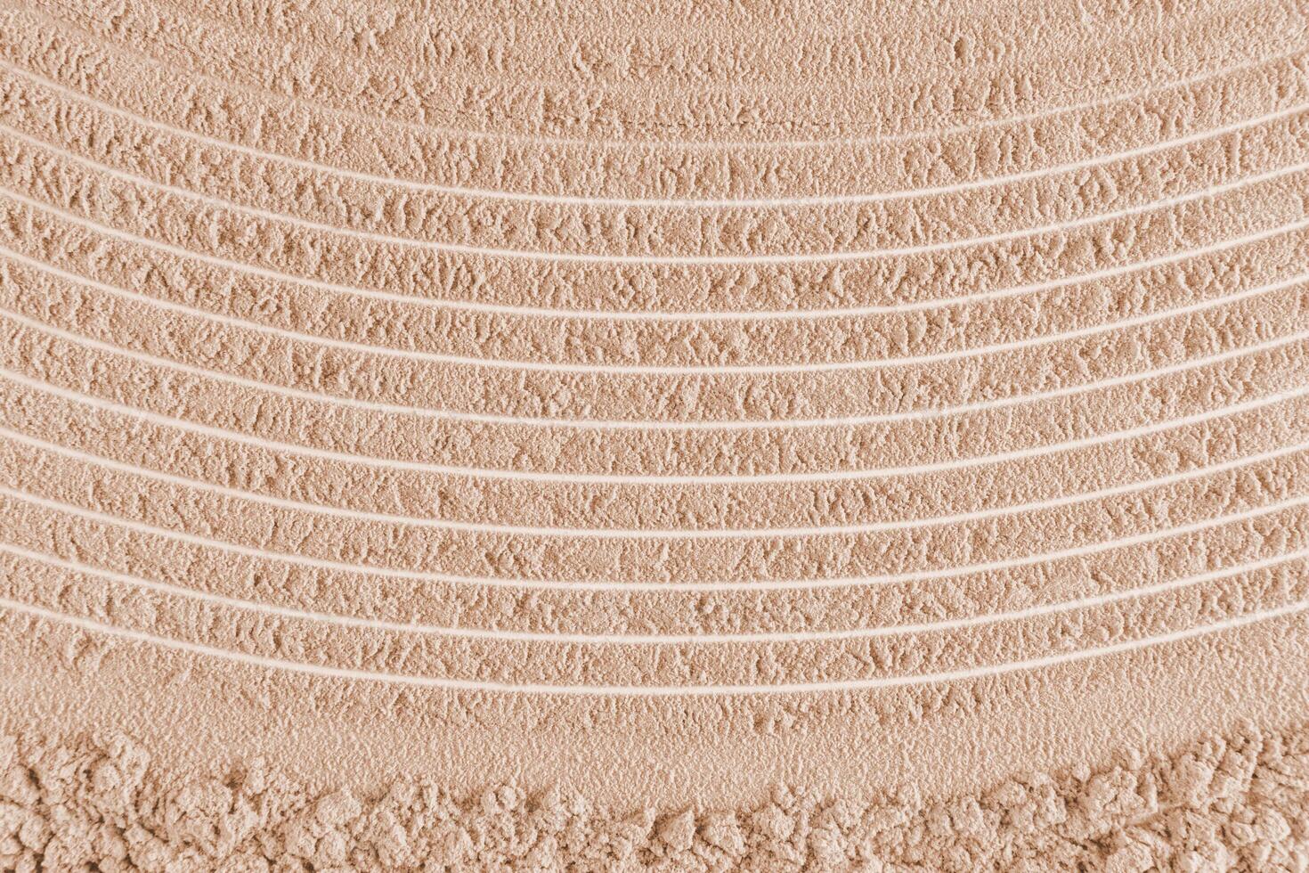 Abstract cosmetic background texture of dry loose powder pastel color. Parallel beautiful lines with a curve. layout for design. A copy space. photo