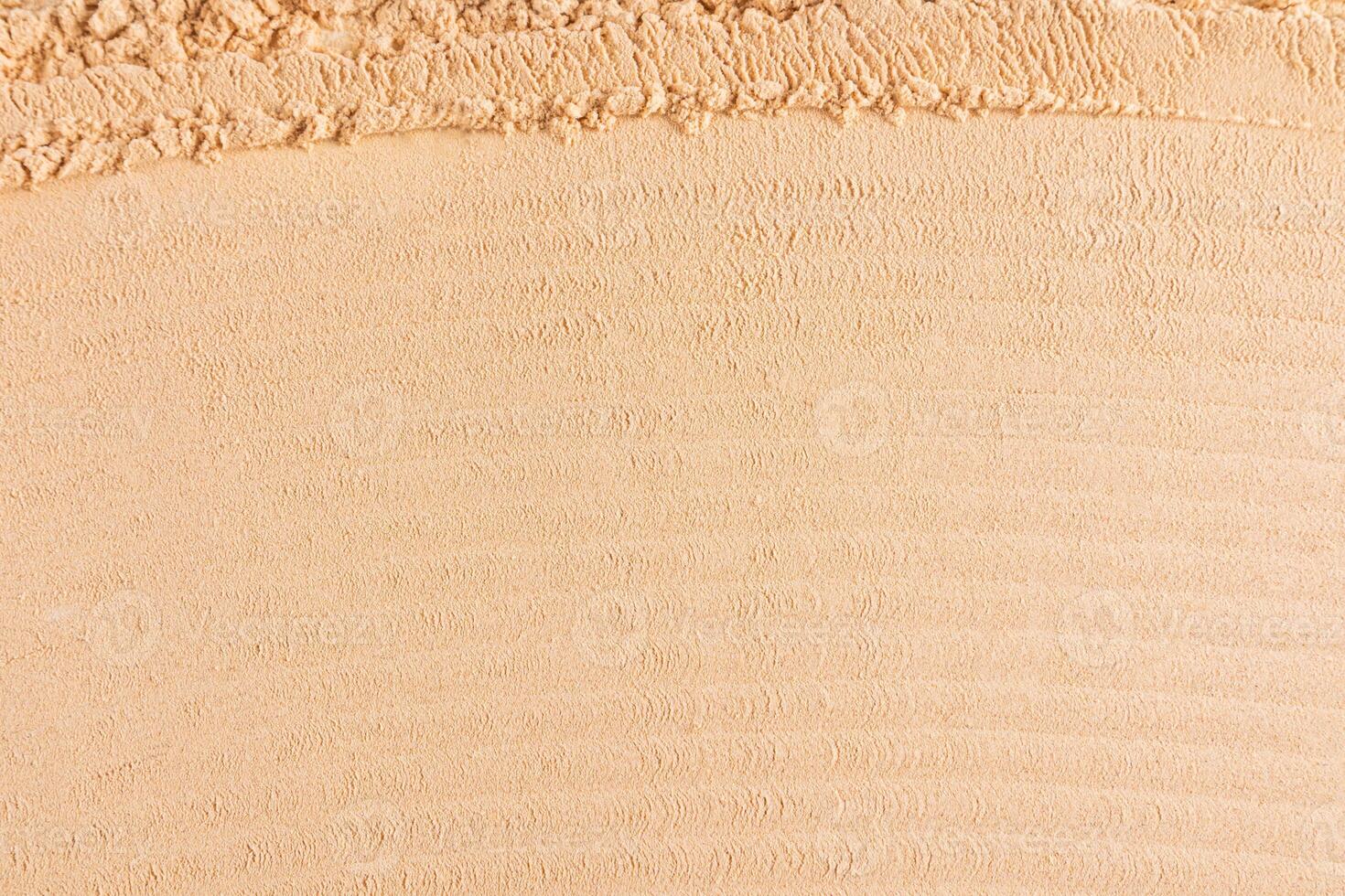 Abstract cosmetic background texture of loose dry powder in natural tone. Soft, parallel texture lines. layout for design. top view. A copy space. photo