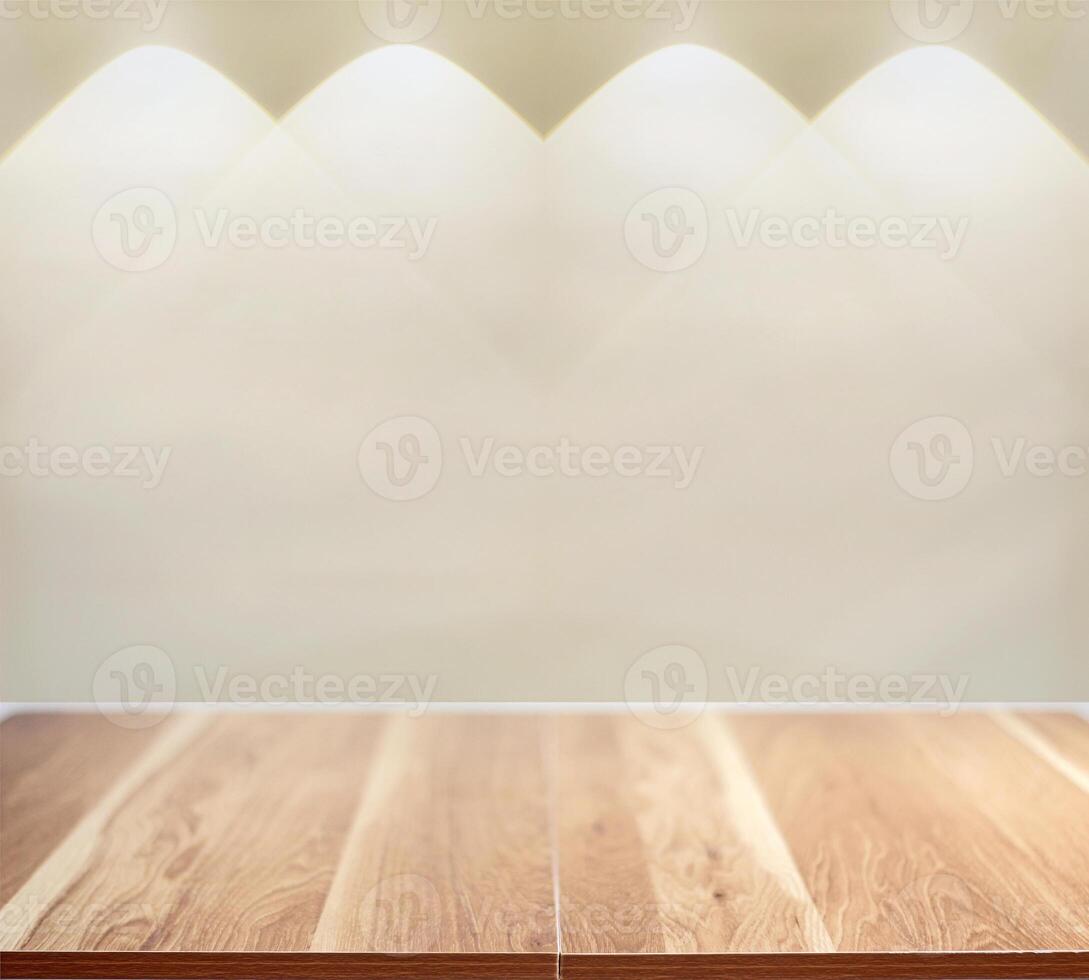 light beam shines on brown empty wooden table top with wall background photo