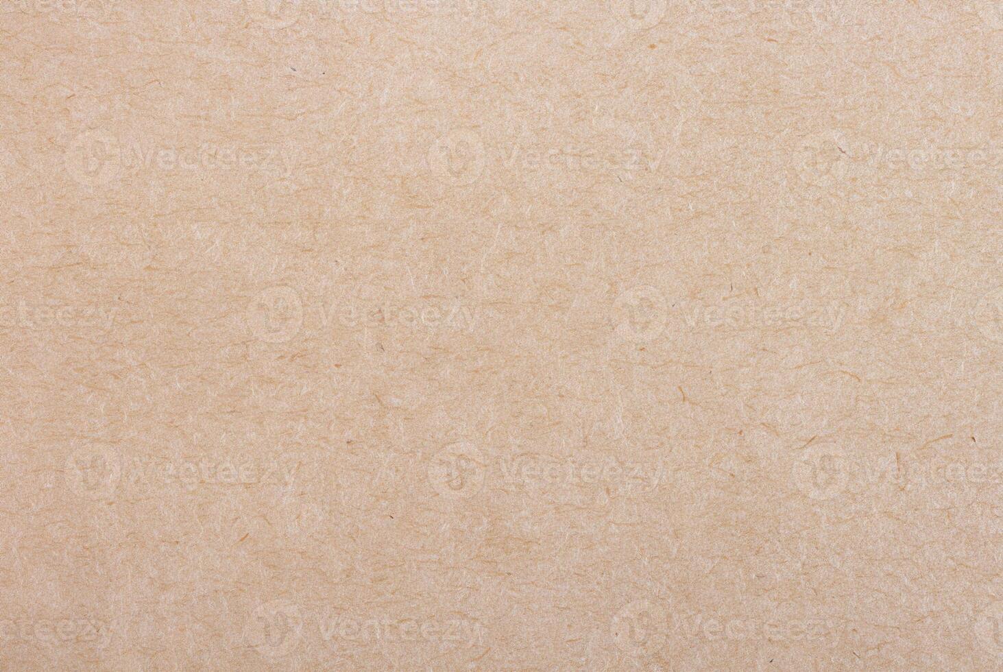 Light brown pulp paper texture with visible fibers and natural rough surface. photo