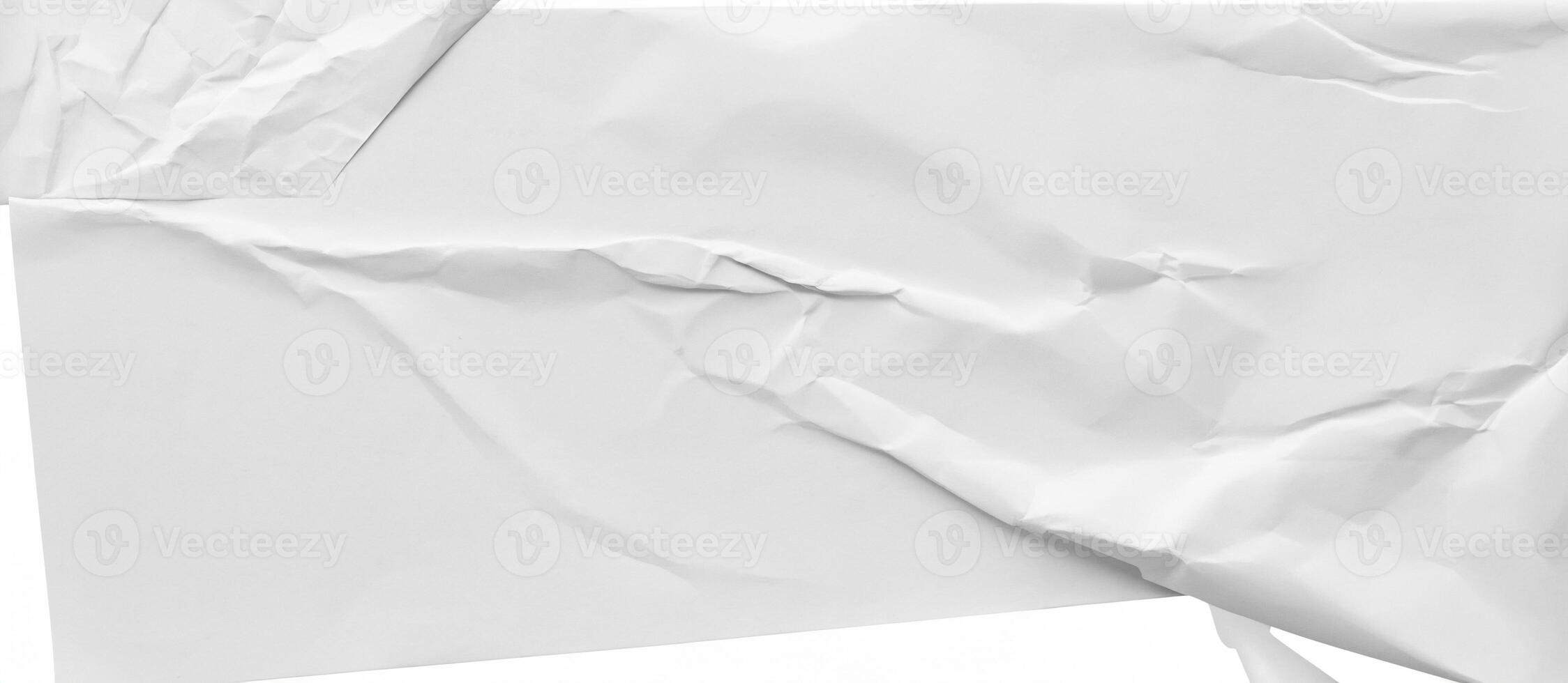Close-up of a crumpled white paper texture with light creases, ideal for backgrounds or design projects. photo