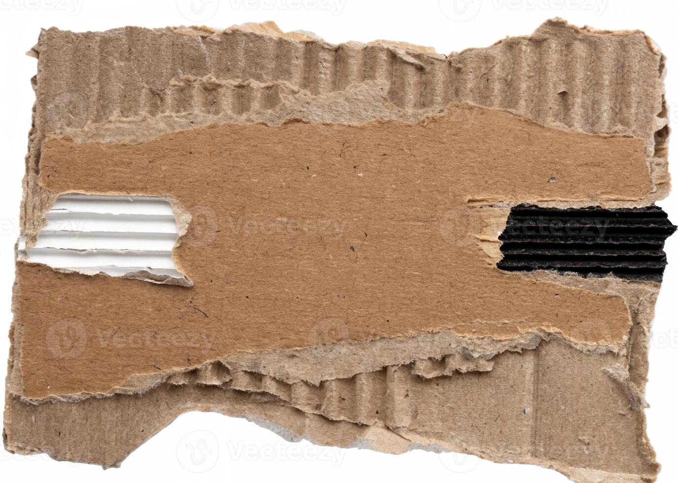 Close-up of torn corrugated cardboard with rough edges and visible texture, ideal for backgrounds and craft designs. photo
