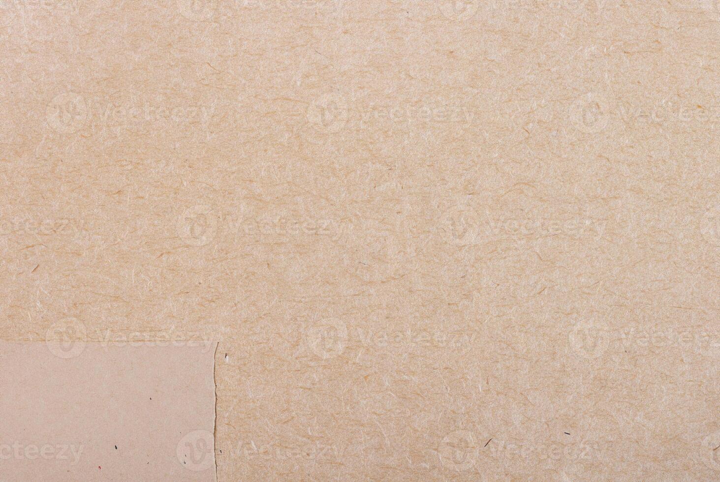 Light brown pulp paper texture with visible fibers and natural rough surface. photo