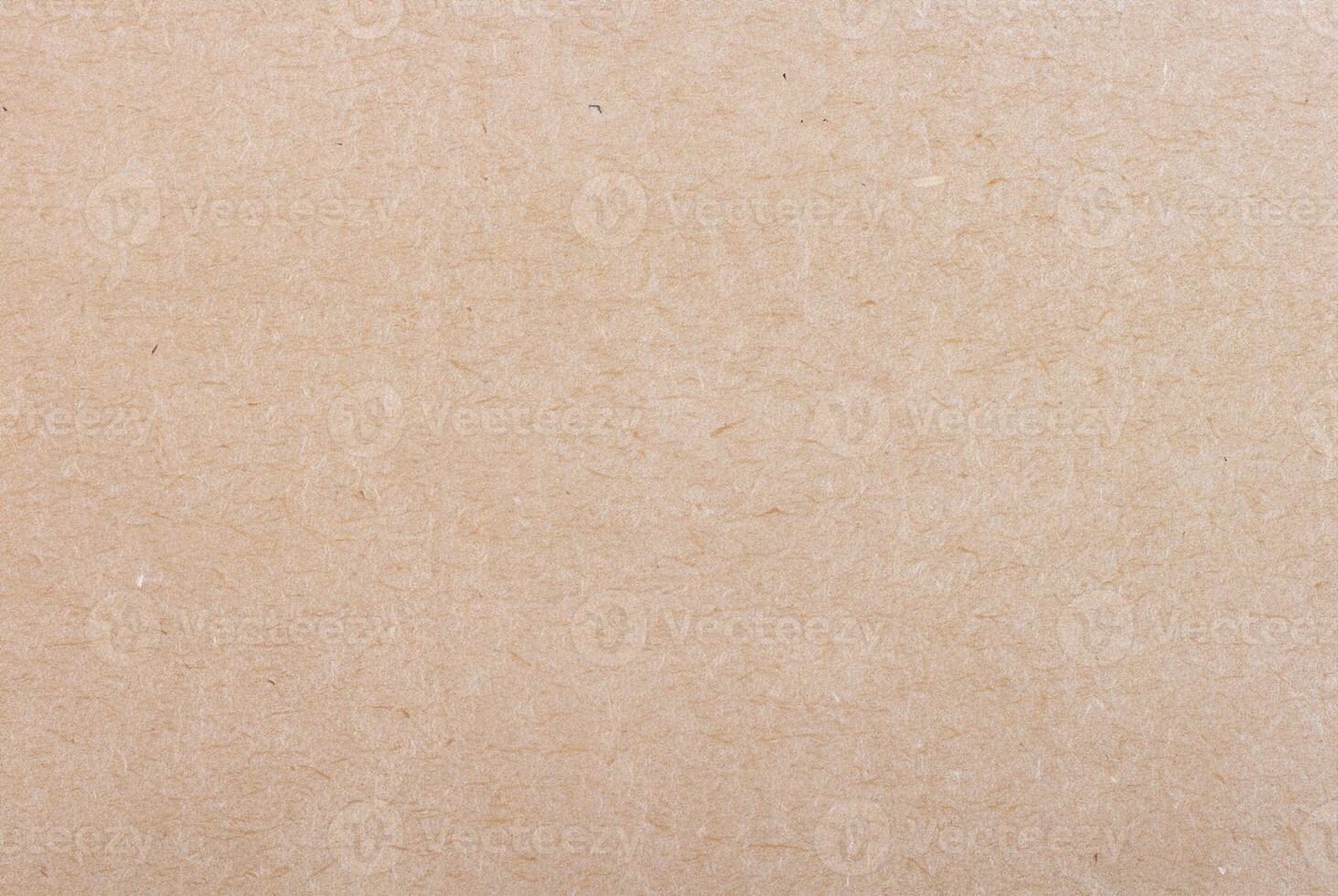 Light brown pulp paper texture with visible fibers and natural rough surface. photo
