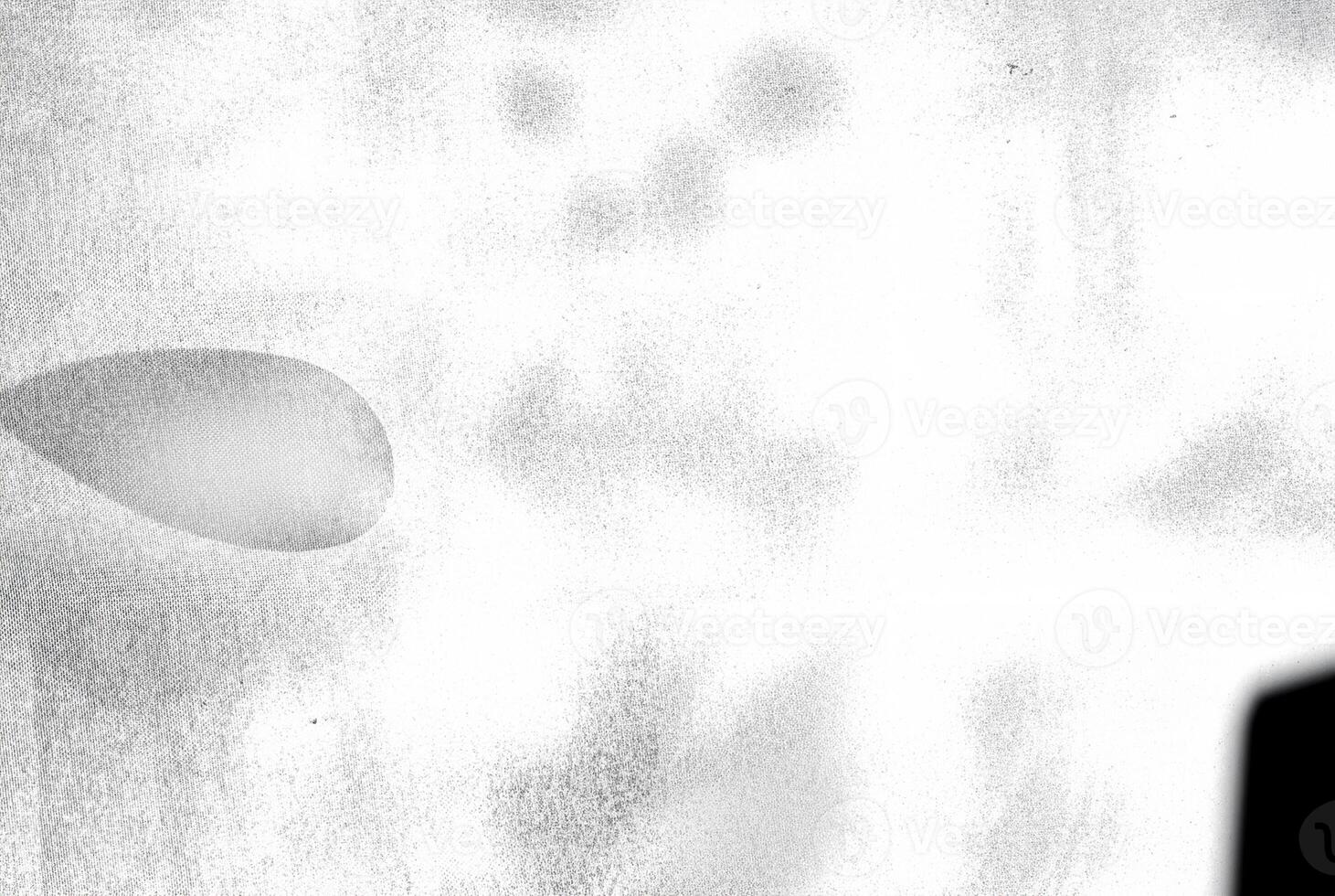 An abstract texture with an overexposed appearance, showing faint shadows in soft, indistinct forms. photo