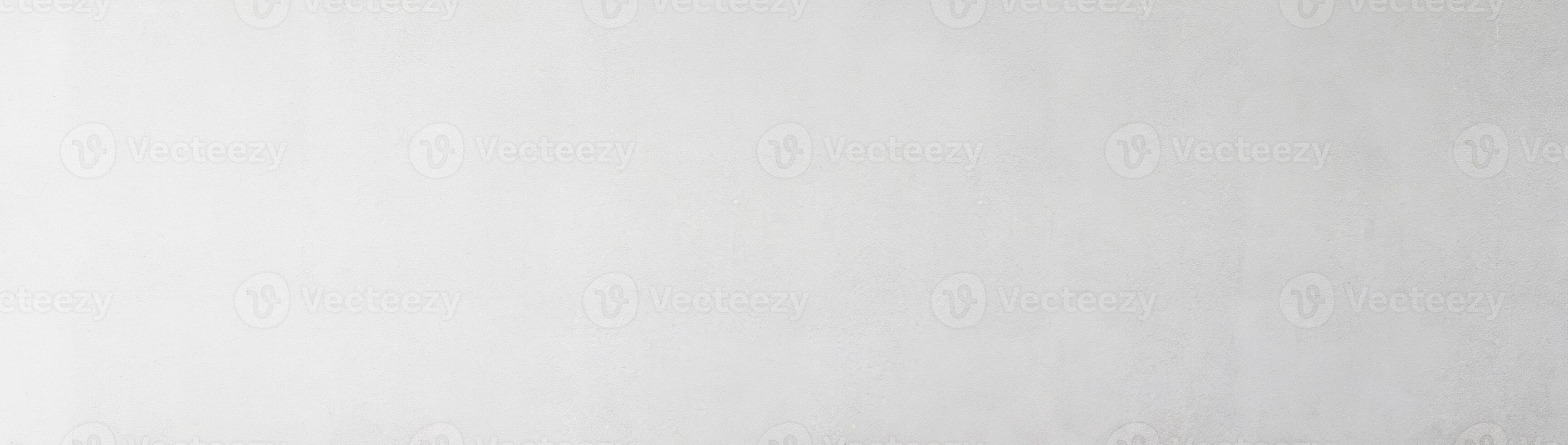 Smooth light gray wall texture with subtle gradient, ideal for background or design elements. photo