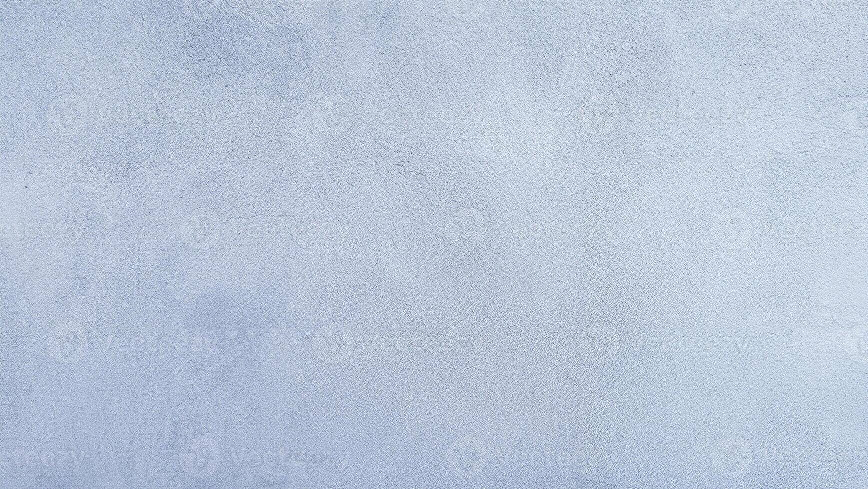 Blue plaster wall texture with a smooth surface, perfect for backgrounds or design projects. photo
