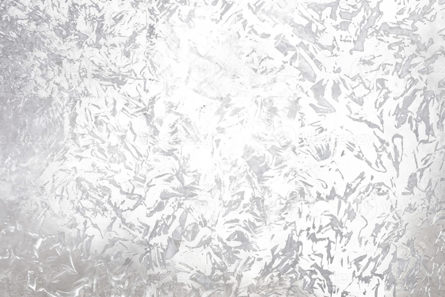 Abstract silver metallic textured background with brushed, irregular patterns, ideal for use in design projects, backgrounds, or as an overlay. photo