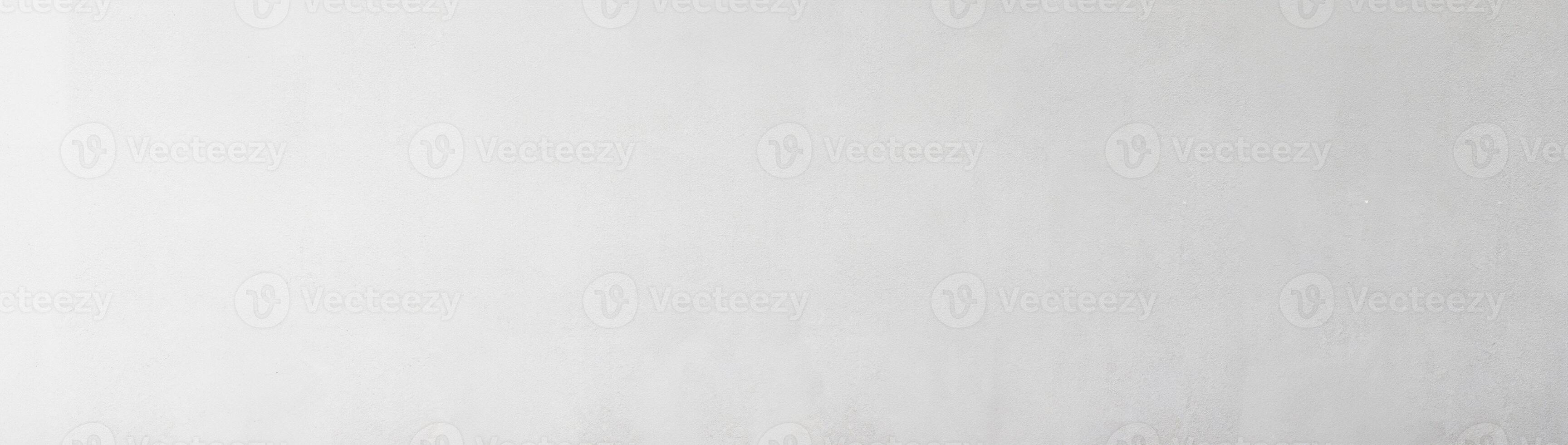Smooth light gray wall texture with subtle gradient, ideal for background or design elements. photo