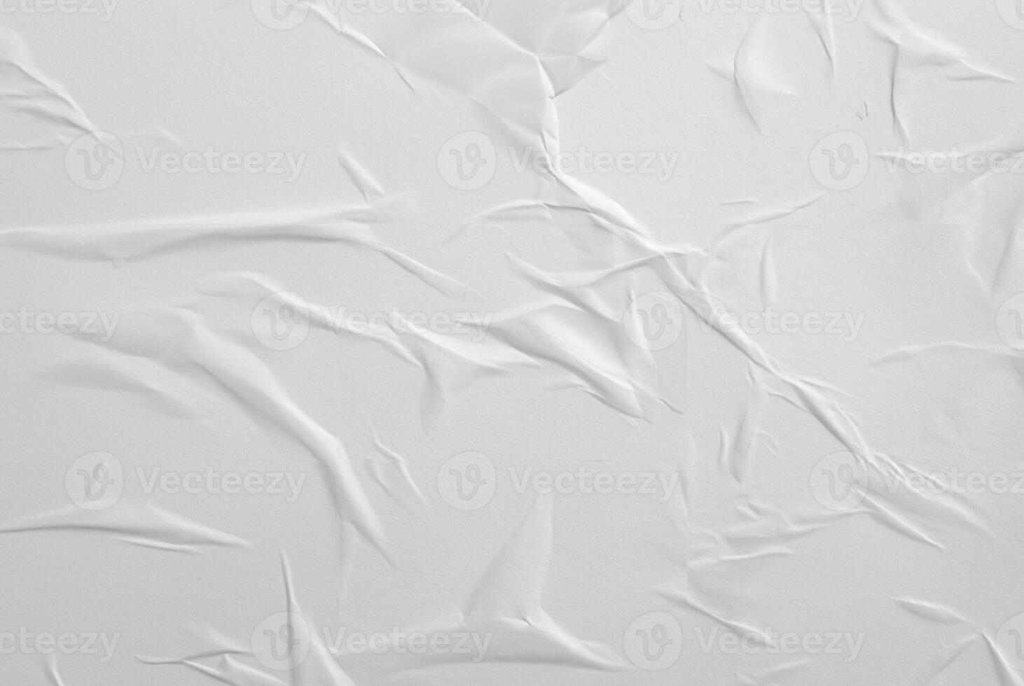 Abstract white paper texture with crumples and wrinkles, perfect for backgrounds or design elements. photo