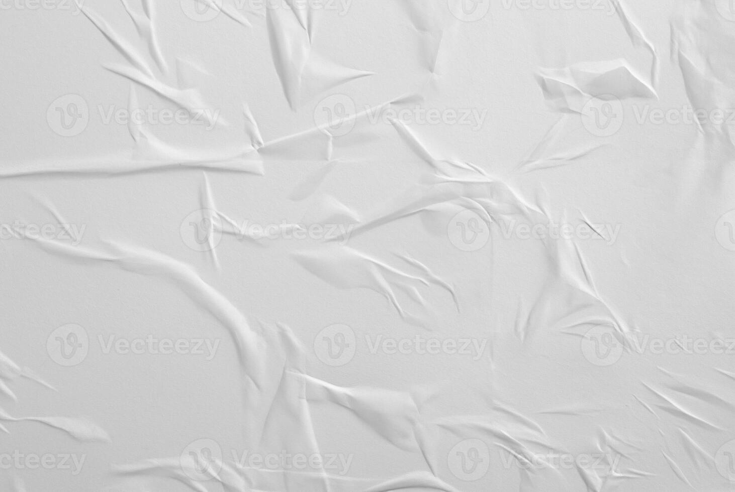 Abstract white paper texture with crumples and wrinkles, perfect for backgrounds or design elements. photo