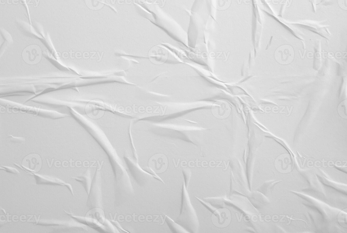 Abstract white paper texture with crumples and wrinkles, perfect for backgrounds or design elements. photo