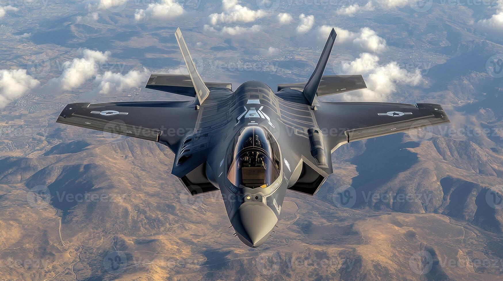 A sleek military jet glides effortlessly amidst clouds above breathtaking mountain ranges photo