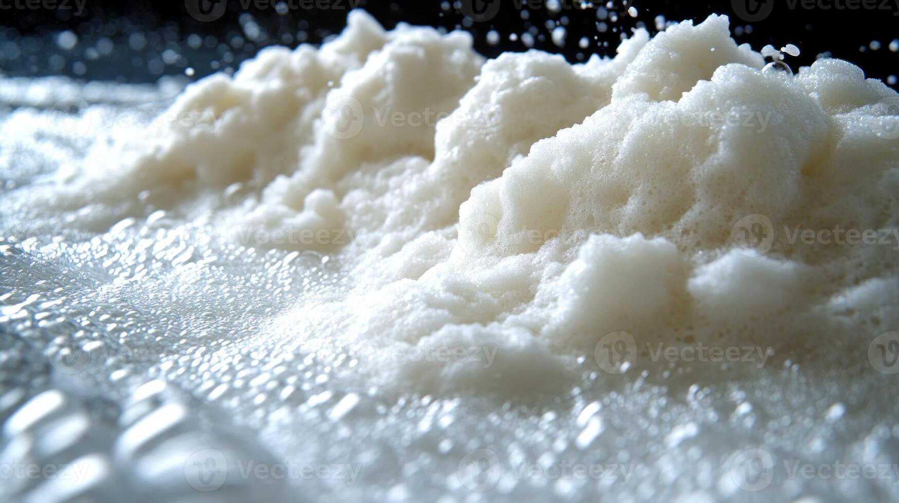 Frothy bubbles rise dramatically and spill over, creating a playful kitchen moment photo