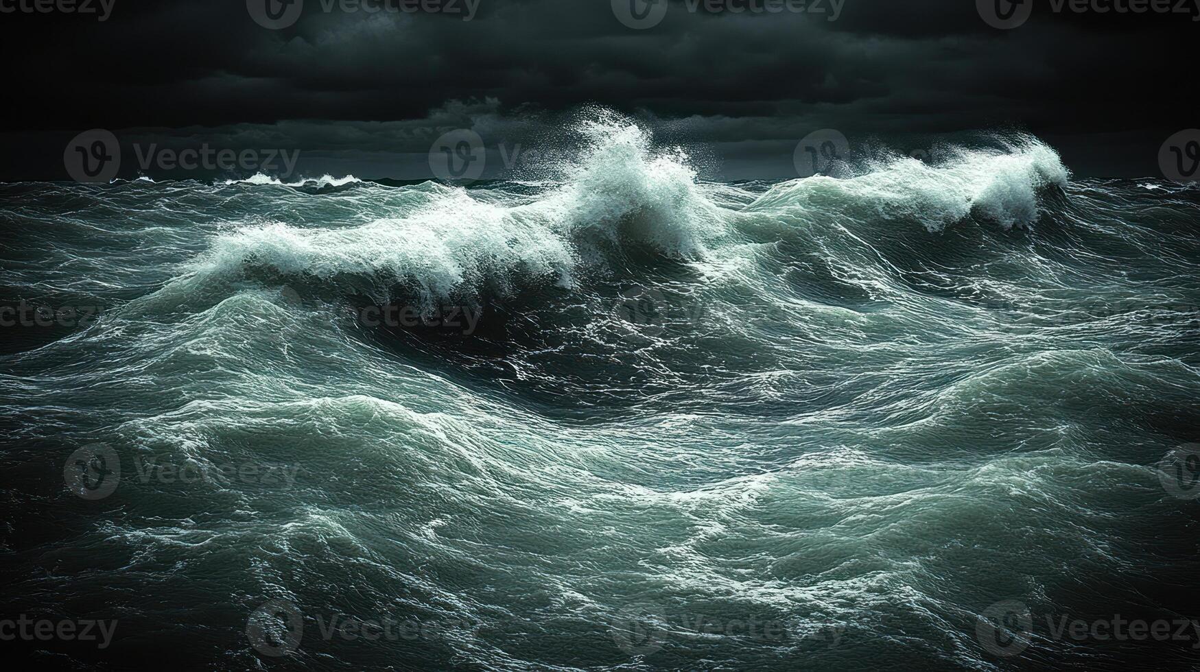 Powerful waves rise and crash against one another under a moody and dark sky photo