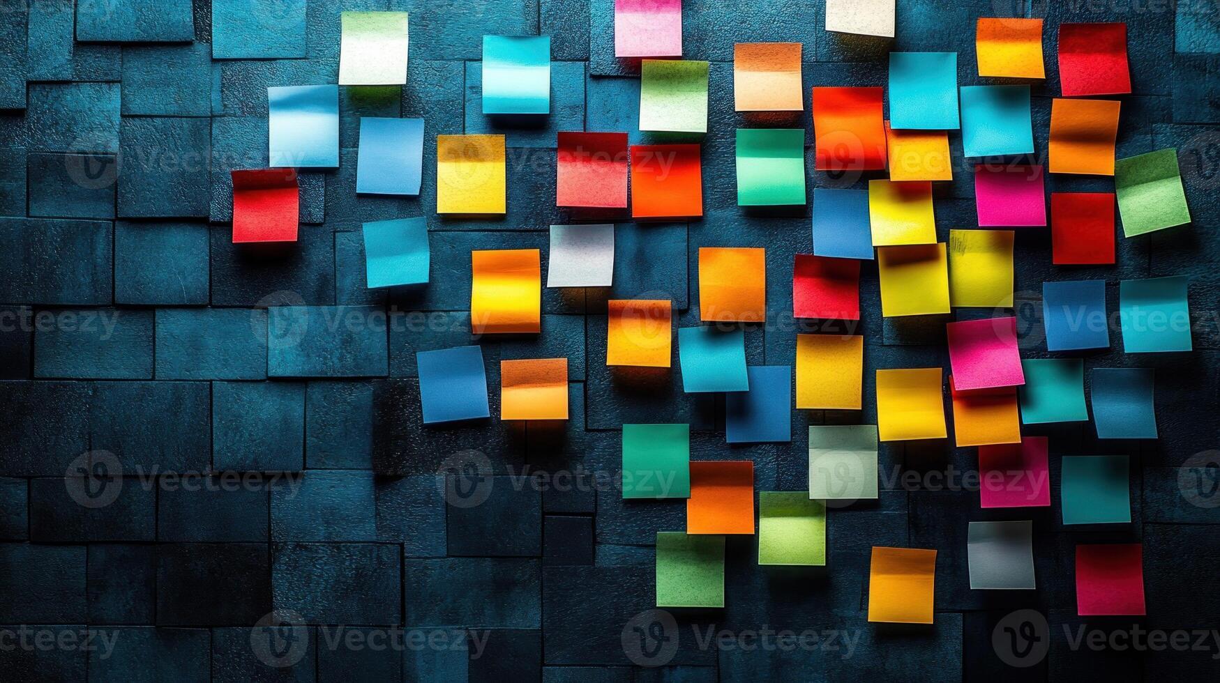 Colorful sticky notes decorate a dark blue surface, highlighting creativity and order photo