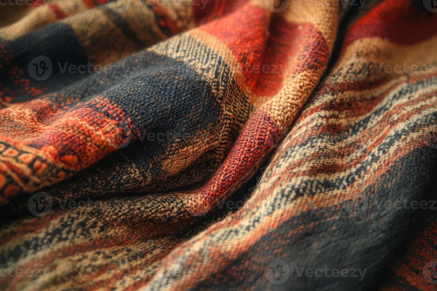 A highly detailed closeup shot of intricately woven fabric showcasing vibrant warm tones and unique designs photo