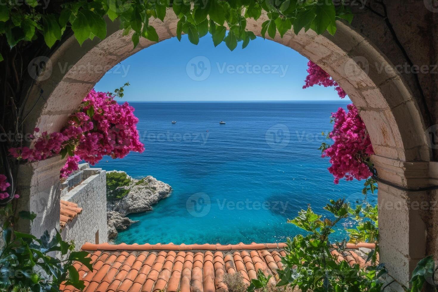 Picture a charming redroofed house with blooming pink flowers, perfectly positioned for a stunning view of the serene azure sea, embodying the beauty of the idyllic Italian coast photo