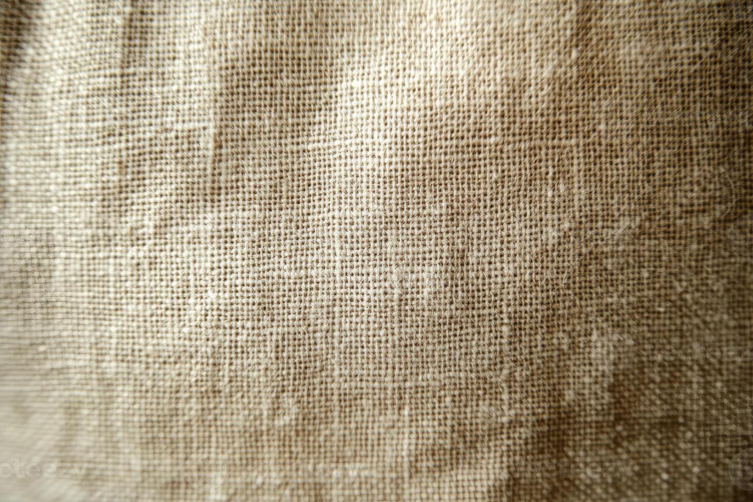A closeup, detailed view of an exquisite, soft, natural linen fabric that highlights its unique texture and weave photo