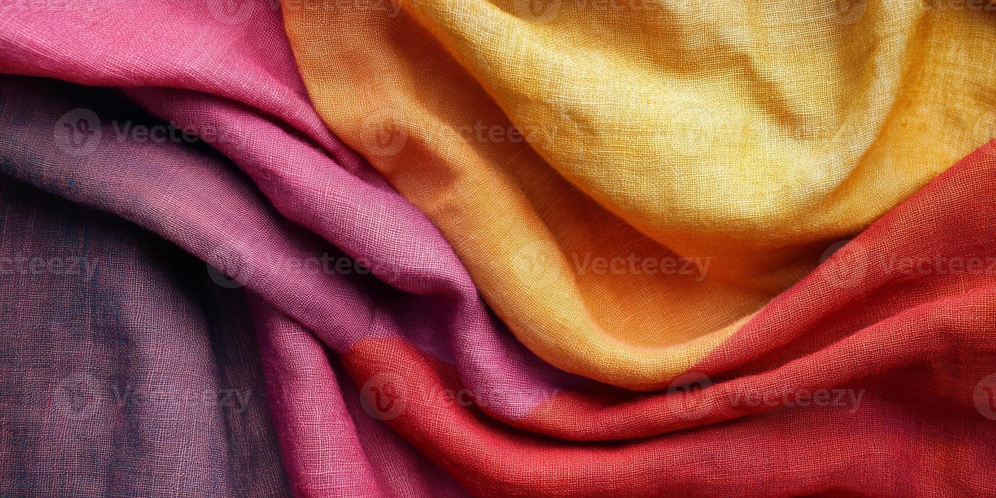 A stunning and vibrant assortment of colorful draped fabric beautifully showcasing rich textures and elegant gradients photo