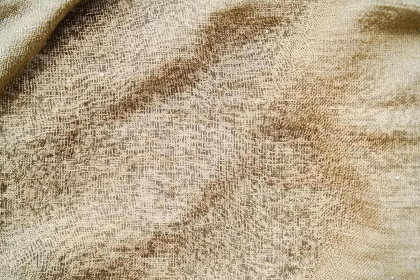 This elegant soft gold fabric background features a subtle but captivating texture ideal for design projects photo