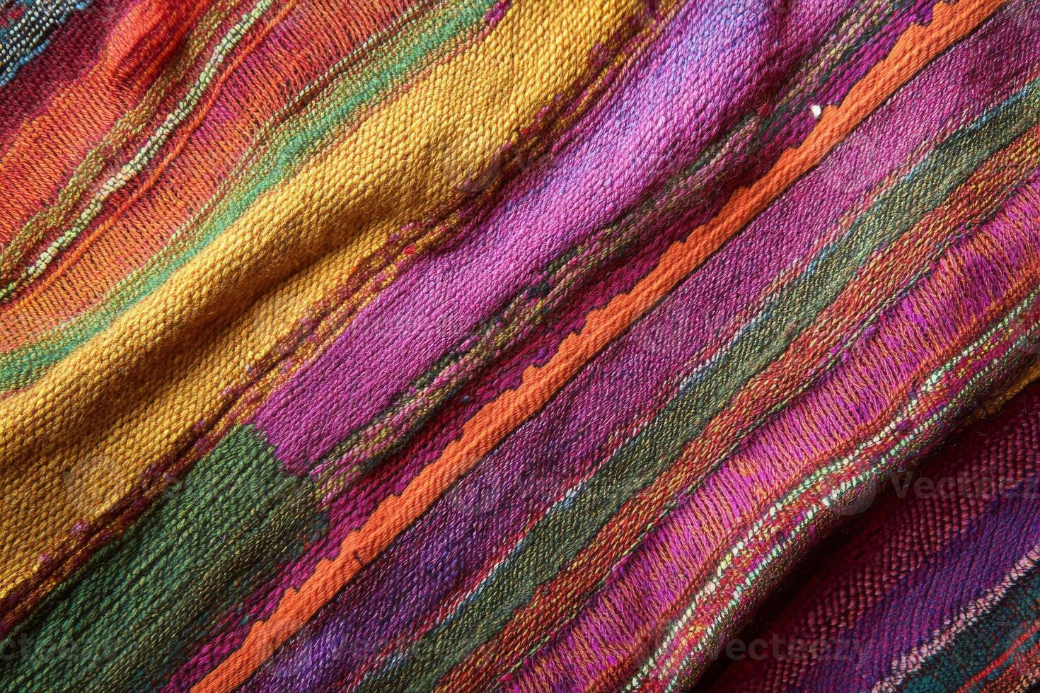 A stunning closeup of a vibrant, multicolored textile showcasing an array of beautiful, intricate stripes photo