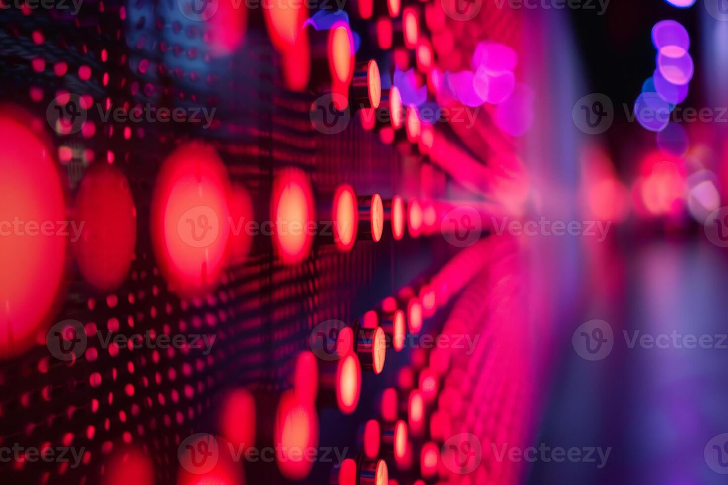 Abstract photo featuring red and pink LED lights with a bokeh effect, ideal for modern and tech themes.