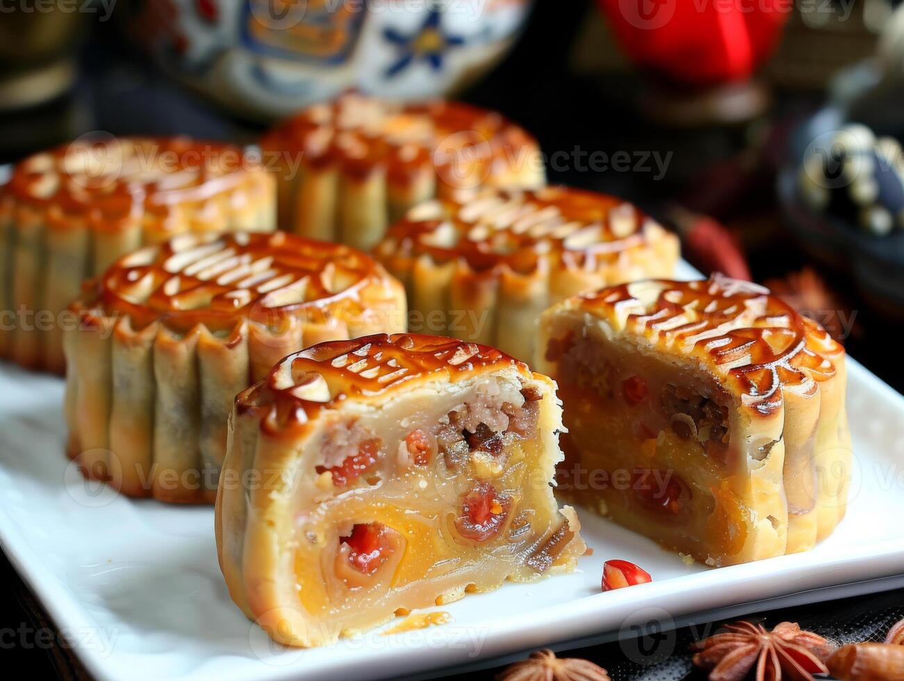 Try these exquisite Vietnamese mooncakes with a golden crust and a variety of fillings like nuts and sweet fruits. They are perfect for celebrations and gifting during the MidAutumn Festival photo